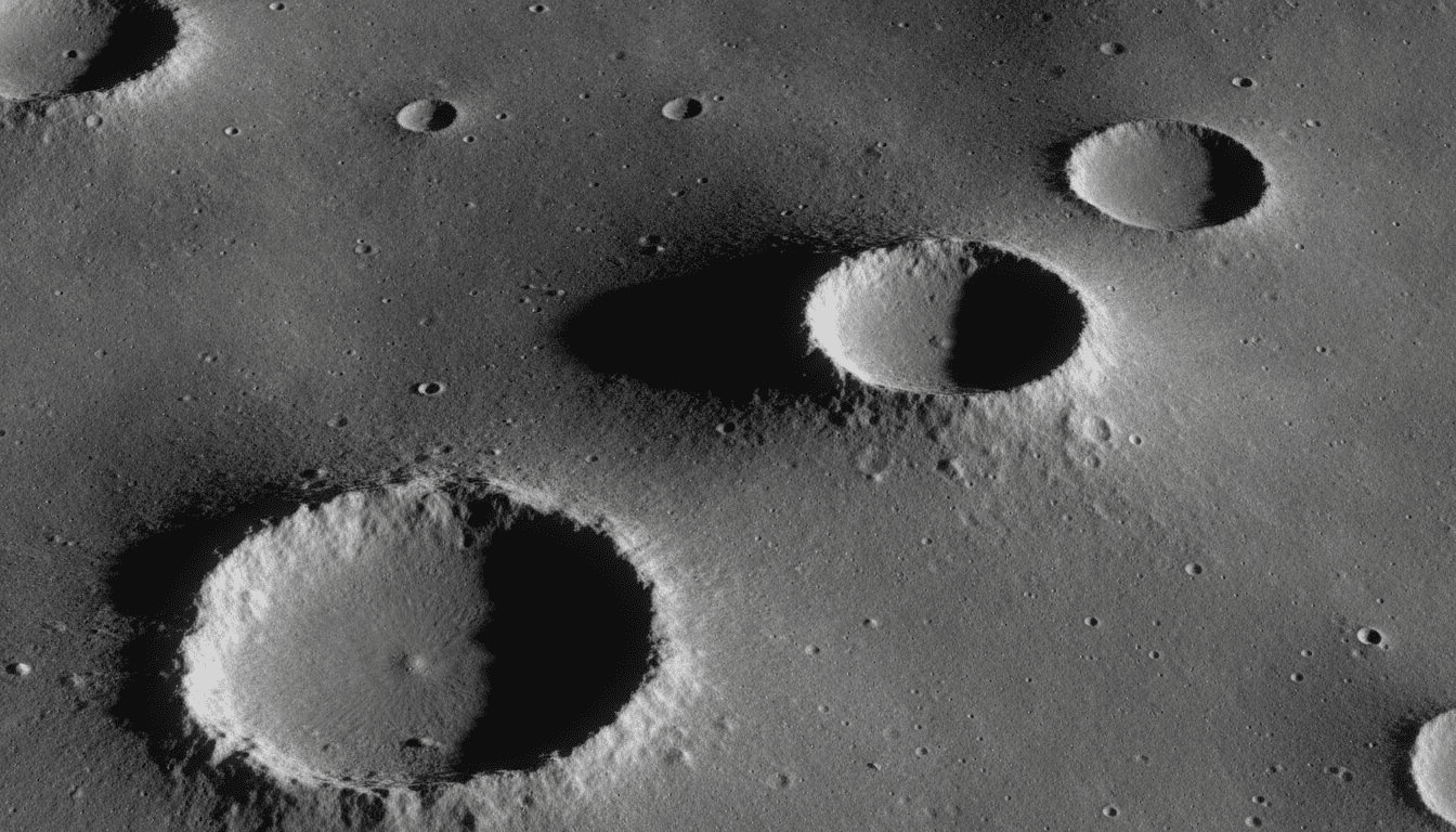 Low sunlight raking across overlapping craters along the lunar terminator